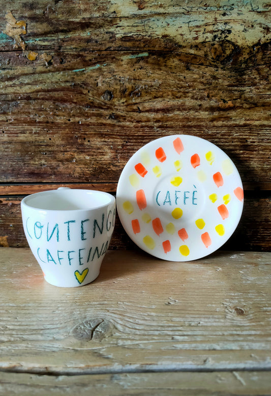 Tazzina da Caffé con Piattino "Contengo Caffeina Arancione"